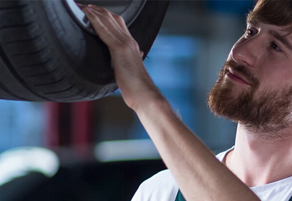 Mechanic starting tire repair