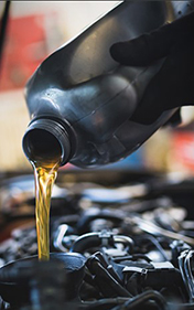 Car oil being poured